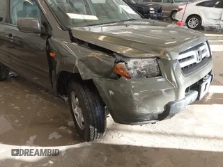 2006 Honda Pilot EX-L with VIN 5FNYF187X6B026463, listed as a IAAI auction lot 41612181 with 242,828 mi miles and . Bid and sale history available at DreamBid. Image 6.