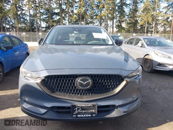 2021 Mazda CX-5 Touring with VIN JM3KFACM6M0483194, listed as a IAAI auction lot 41503907 with 41,237 mi miles. Bid and sale history available at carsss.com. Image 13.