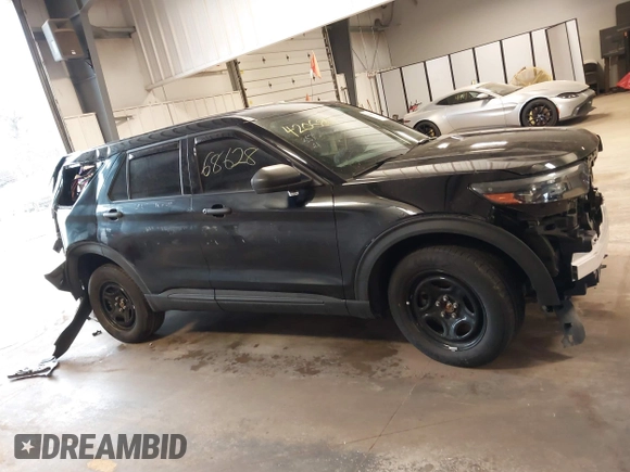 2023 Ford Police Interceptor Utility z VIN 1FM5K8AB1PGA03761, wystawiony jako IAAI lot #42068628 z przebiegiem 39 009 mil mil oraz . Historia ofert i sprzedaży dostępna na DreamBid. Obrazek 13.