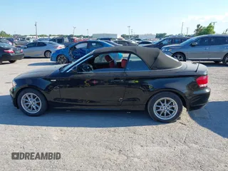 2011 BMW 1 Series 128i with VIN WBAUL7C55BVM81049, listed as a IAAI auction lot 41892811 with 50,659 mi miles and . Bid and sale history available at carsss.com. Image 15.
