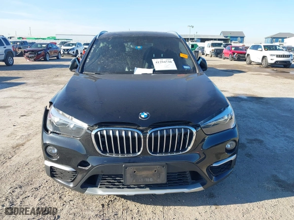 2018 BMW X1 sDrive28i with VIN WBXHU7C37J5H43318, listed as a IAAI auction lot 41294730 with 73,600 mi miles. Bid and sale history available at carsss.com. Image 12.