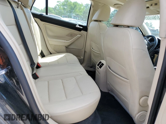 2014 Volkswagen Jetta TDI w/Sunroof z VIN 3VWPL7AJ4EM621796, wystawiony jako Copart lot #57605935 z przebiegiem 102 506 mil mil oraz Szkoda całkowita • Salvage title. Historia ofert i sprzedaży dostępna na DreamBid. Obrazek 10.