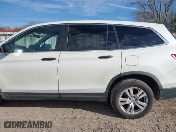 2016 Honda Pilot LX with VIN 5FNYF5H16GB033964, listed as a IAAI auction lot 41607930 with 168,137 mi miles and . Bid and sale history available at DreamBid. Image 14.