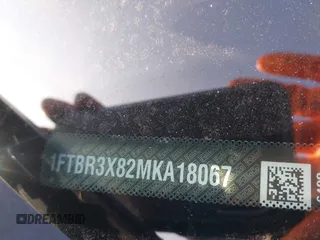 2021 Ford Transit Cargo z VIN 1FTBR3X82MKA18067, wystawiony jako IAAI lot #41205233 z przebiegiem 48 391 mil mil oraz . Historia ofert i sprzedaży dostępna na DreamBid. Obrazek 9.