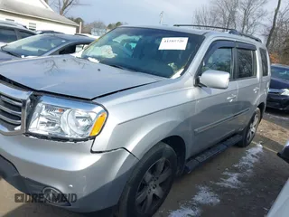 2014 Honda Pilot Touring with VIN 5FNYF4H9XEB038551, listed as a IAAI auction lot 41585720 with 150,725 mi miles and . Bid and sale history available at carsss.com. Image 17.