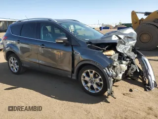 2016 Ford Escape Titanium with VIN 1FMCU9J96GUC63384, listed as a Copart auction lot 52255725 with 136,869 mi miles and Salvage Title. Bid and sale history available at carsss.com. Image 4.