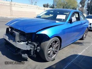 2015 BMW 2 Series M235i with VIN WBA1J7C59FV254140, listed as a IAAI auction lot 41642427 with 23,957 mi miles and . Bid and sale history available at carsss.com. Image 18.