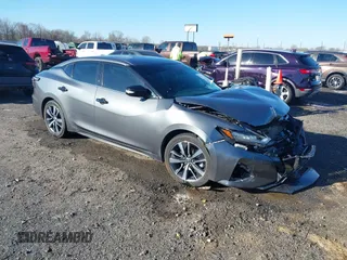 2020 Nissan Maxima SV with VIN 1N4AA6CV4LC360876, listed as a IAAI auction lot 41807015 with 82,638 mi miles. Bid and sale history available at carsss.com. Image 1.