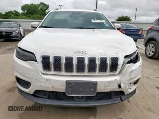 2021 Jeep Cherokee Latitude with VIN 1C4PJLCB3MD180163, listed as a Copart auction lot 60833865 with 95,259 mi miles and Salvage title. Bid and sale history available at DreamBid. Image 5.
