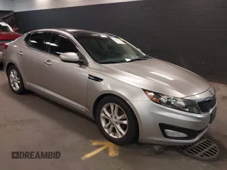 2012 Kia Optima EX z VIN 5XXGN4A74CG079839, wystawiony jako IAAI lot #42094275 z przebiegiem 295 661 mil mil oraz . Historia ofert i sprzedaży dostępna na DreamBid. Obrazek 1.