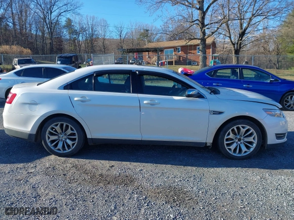 2013 Ford Taurus Limited with VIN 1FAHP2F82DG131585, listed as a IAAI auction lot 41076163 with 134,916 mi miles. Bid and sale history available at carsss.com. Image 14.