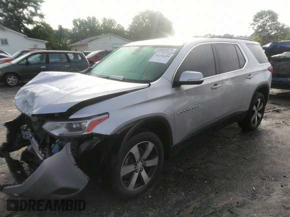 2021 Chevrolet Traverse LT with VIN 1GNERHKW6MJ157311, listed as a IAAI auction lot 42256458 with 97,635 mi miles and . Bid and sale history available at DreamBid. Image 2.