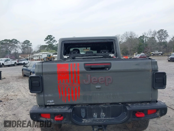2021 Jeep Gladiator Rubicon with VIN 1C6JJTBG7ML554354, listed as a IAAI auction lot 41796943 with 61,513 mi miles and . Bid and sale history available at DreamBid. Image 17.
