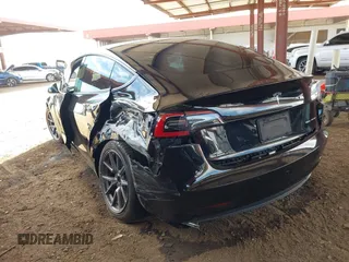 2022 Tesla Model 3 Long Range with VIN 5YJ3E1EB3NF257077, listed as a IAAI auction lot 42086629 with Not Provided miles and . Bid and sale history available at DreamBid. Image 3.