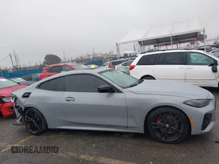 2023 BMW 4 Series 430i with VIN WBA53AP09PCM33735, listed as a IAAI auction lot 41547279 with 28,822 mi miles and . Bid and sale history available at DreamBid. Image 14.