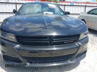 2015 Dodge Charger SXT with VIN 2C3CDXHG2FH852208, listed as a IAAI auction lot 42120021 with 156,486 mi miles and . Bid and sale history available at DreamBid. Image 6.