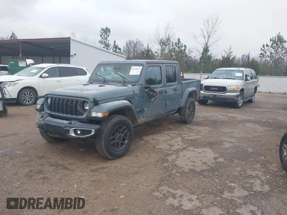 2024 Jeep Gladiator Sport z VIN 1C6HJTAG5RL127973, wystawiony jako IAAI lot #41248039 z przebiegiem 2 648 mil mil oraz . Historia ofert i sprzedaży dostępna na DreamBid. Obrazek 17.