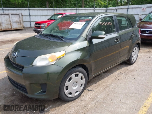 2012 Scion xD with VIN JTKKU4B46C1022001, listed as a IAAI auction lot 42475852 with 210,580 mi miles and . Bid and sale history available at DreamBid. Image 2.