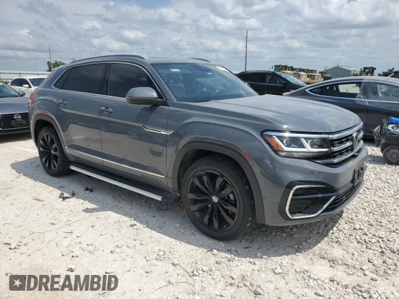 2022 Volkswagen Atlas SEL Premium R-Line with VIN 1V2FE2CA6NC219819, listed as a Copart auction lot 54796015 with 33,911 mi miles and Clean title. Bid and sale history available at DreamBid. Image 4.