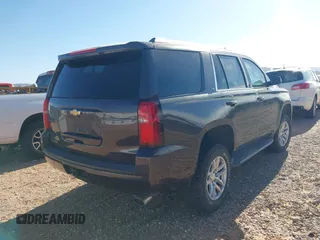 2015 Chevrolet Tahoe LS with VIN 1GNSCAKC9FR122896, listed as a IAAI auction lot 42239812 with 164,888 mi miles and . Bid and sale history available at DreamBid. Image 15.