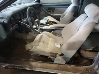 1987 Pontiac Firebird with VIN 1G2FS21S4HN213083, listed as a Copart auction lot 69101254 with 172,214 mi miles and Salvage title. Bid and sale history available at DreamBid. Image 7.