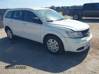 2014 Dodge Journey SE with VIN 3C4PDCAB2ET258681, listed as a IAAI auction lot 42558132 with 136,569 mi miles and . Bid and sale history available at DreamBid. Image 1.