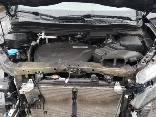 2019 Honda Passport EX-L z VIN 5FNYF8H50KB028465, wystawiony jako Copart lot #56160545 z przebiegiem 100 636 mil mil oraz Szkoda całkowita • Salvage title. Historia ofert i sprzedaży dostępna na DreamBid. Obrazek 12.