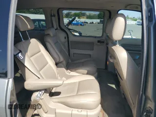 2004 Ford Freestar SEL z VIN 2FMDA522X4BA41942, wystawiony jako Copart lot #54007555 z przebiegiem 119 877 mil mil oraz Szkoda całkowita • Salvage title. Historia ofert i sprzedaży dostępna na DreamBid. Obrazek 11.
