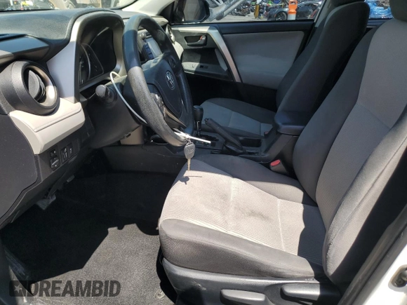 2014 Toyota RAV4 LE with VIN JTMZFREV7EJ018804, listed as a Copart auction lot 62738795 with 97,265 mi miles and Salvage title. Bid and sale history available at DreamBid. Image 7.