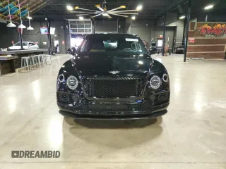 2020 Bentley Bentayga V8 z VIN SJAAM2ZV9LC031383, wystawiony jako Copart lot #74666394 z przebiegiem 30 830 mil mil oraz Szkoda całkowita • Salvage title. Historia ofert i sprzedaży dostępna na DreamBid. Obrazek 2.