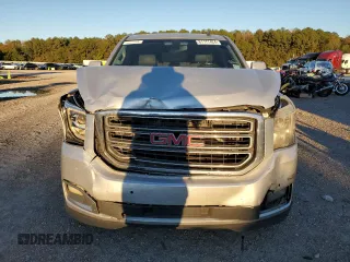 2015 GMC Yukon XL SLE z VIN 1GKS1GKC7FR285469, wystawiony jako Copart lot #81177424 z przebiegiem Nie podano mil oraz Czysty tytuł • Clean title. Historia ofert i sprzedaży dostępna na DreamBid. Obrazek 5.