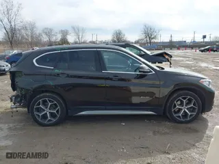 2017 BMW X1 xDrive28i with VIN WBXHT3C38H5F70947, listed as a IAAI auction lot 41652626 with 76,843 mi miles. Bid and sale history available at carsss.com. Image 14.
