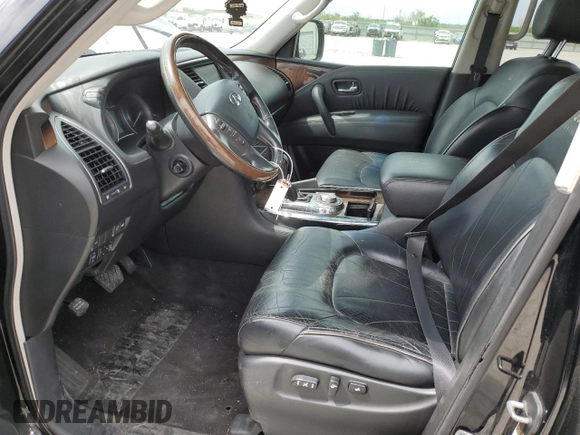 2011 Infiniti QX56 7-passenger with VIN JN8AZ2NE8B9005573, listed as a Copart auction lot 53086155 with 166,571 mi miles and Clean Title. Bid and sale history available at carsss.com. Image 7.