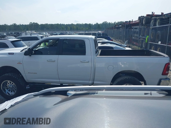 2019 Ram 2500 Lone Star with VIN 3C6UR5DL0KG590912, listed as a IAAI auction lot 42669594 with 128,789 mi miles and . Bid and sale history available at DreamBid. Image 14.