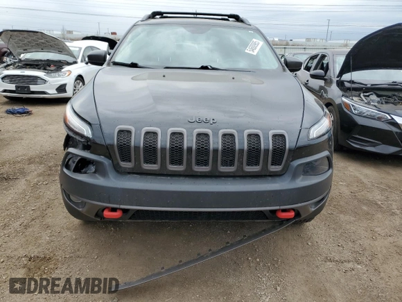 2015 Jeep Cherokee Trailhawk с VIN 1C4PJMBB5FW615179, выставлен на аукционе Copart как лот 54600985 с пробегом 133 724 миль миль и Списание • Salvage title. История ставок и продаж доступна на DreamBid. Изображение 5.