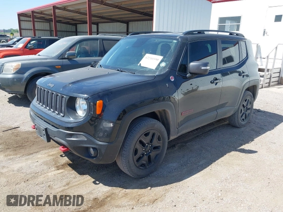 2018 Jeep Renegade Trailhawk with VIN ZACCJBCB0JPG78827, listed as a IAAI auction lot 42240590 with 72,736 mi miles and . Bid and sale history available at DreamBid. Image 2.