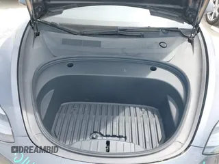 2023 Tesla Model 3 with VIN 5YJ3E1EA5PF565071, listed as a IAAI auction lot 42232719 with 15,389 mi miles and . Bid and sale history available at DreamBid. Image 10.