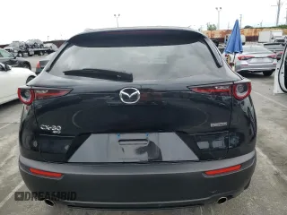 2024 Mazda CX-30 S Carbon Edition z VIN 3MVDMBCM1RM618954, wystawiony jako Copart lot #53690825 z przebiegiem 16 776 mil mil oraz Szkoda całkowita • Salvage title. Historia ofert i sprzedaży dostępna na DreamBid. Obrazek 6.