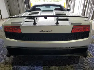 2013 Lamborghini Gallardo z VIN ZHWGU6BZ7DLA12811, wystawiony jako Copart lot #51696395 z przebiegiem 35 389 mil mil oraz Szkody całkowita. Historia ofert i sprzedaży dostępna na DreamBid. Obrazek 6.