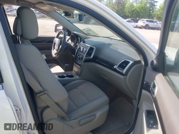 2012 Jeep Grand Cherokee Laredo with VIN 1C4RJFAG2CC176313, listed as a IAAI auction lot 42098127 with 162,556 mi miles. Bid and sale history available at carsss.com. Image 5.