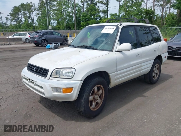1999 Toyota RAV4 with VIN JT3GP10V8X7054552, listed as a IAAI auction lot 42361645 with 266,630 mi miles and . Bid and sale history available at DreamBid. Image 2.