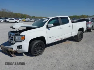 2019 GMC Canyon 4WD SLE z VIN 1GTG6CEN0K1353094, wystawiony jako IAAI lot #42065160 z przebiegiem 73 235 mil mil oraz . Historia ofert i sprzedaży dostępna na DreamBid. Obrazek 17.