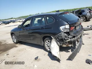 2015 BMW X1 xDrive28i z VIN WBAVL1C59FVY32553, wystawiony jako Copart lot #56513435 z przebiegiem 131 831 mil mil oraz Szkoda całkowita • Salvage title. Historia ofert i sprzedaży dostępna na DreamBid. Obrazek 2.
