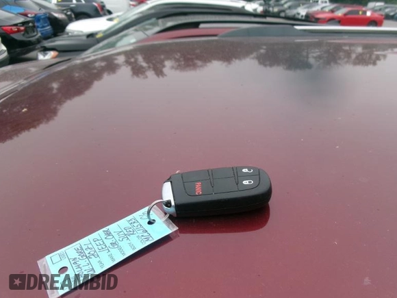 2021 Jeep Grand Cherokee Laredo X with VIN 1C4RJFAG3MC611583, listed as a IAAI auction lot 42631284 with 99,457 mi miles and . Bid and sale history available at DreamBid. Image 3.