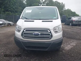 2019 Ford Transit z VIN 1FTYR1YM7KKB20309, wystawiony jako IAAI lot #42604821 z przebiegiem 42 413 mil mil oraz . Historia ofert i sprzedaży dostępna na DreamBid. Obrazek 13.
