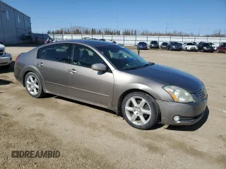 2004 Nissan Maxima SE z VIN 1N4BA41E24C877137, wystawiony jako Copart lot #52534115 z przebiegiem 219 798 mil mil oraz Szkoda całkowita • Salvage title. Historia ofert i sprzedaży dostępna na DreamBid. Obrazek 4.