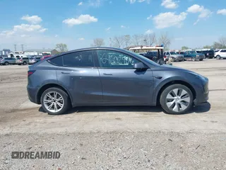 2022 Tesla Model Y Long Range with VIN 7SAYGDEE3NA007737, listed as a IAAI auction lot 42128359 with 42,597 mi miles and . Bid and sale history available at carsss.com. Image 14.