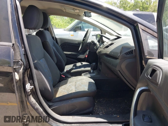 2013 Ford Fiesta SE z VIN 3FADP4BJ7DM144261, wystawiony jako IAAI lot #42281950 z przebiegiem 149 437 mil mil oraz . Historia ofert i sprzedaży dostępna na DreamBid. Obrazek 5.