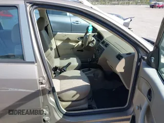 2005 Ford Focus S with VIN 1FAFP34N35W149316, listed as a IAAI auction lot 41699144 with 133,372 mi miles. Bid and sale history available at carsss.com. Image 5.