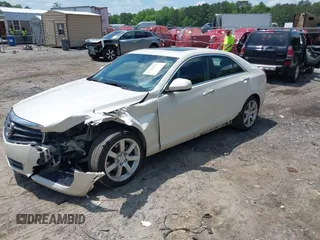 2014 Cadillac ATS Standard RWD with VIN 1G6AA5RA6E0171128, listed as a IAAI auction lot 42226859 with 90,308 mi miles and . Bid and sale history available at DreamBid. Image 2.